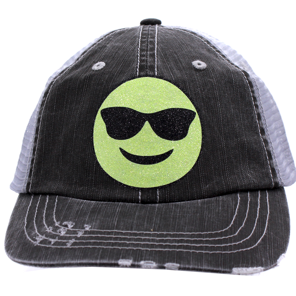 black and grey trucker cap with a green smiling emoji with sunglasses